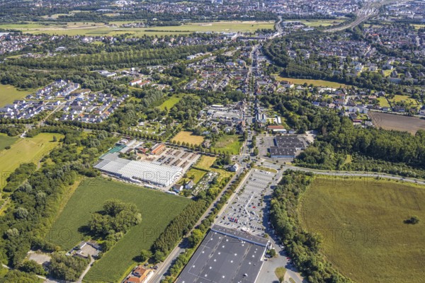 Aerial view, business location Münsterstraße, roundabout Warendorfer Straße - Münsterstraße, Real department stores', Hamm, Ruhr area, North Rhine-Westphalia, Germany, DE, Europe, birds-eyes, view, aerial photography, aerial photography, overview, overview, bird's eye view, shopping, food, clothing, consumption, consumer, road traffic, connection, road layout, intersection, junction, traffic management, driving licence, transport, traffic, infrastructure, logistics