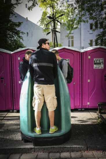 DEU Germany Germany Berlin 1st May demonstration through Kreuzberg.toilets, Dixie KLo
