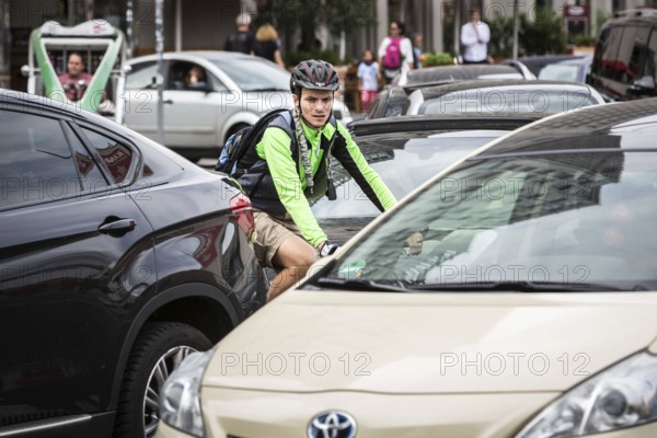 DEU Germany Germany Berlin scene with cyclists in the capital.cyclists and motorists get in each other's way at the junction at Potsdamer Platz
