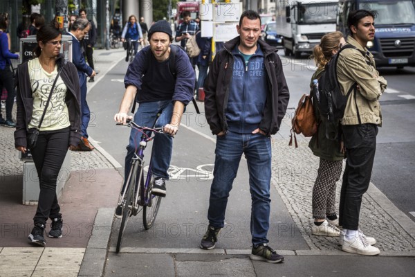 DEU Germany Germany Berlin scene with cyclists in the capital.cyclists and pedestrians get in each other's way on the cycle path at Potsdamer Platz