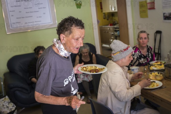 DEU Germany Germany Berlin Homeless woman meet at Eva's Haltestelle, a drop-in centre for those in need run by the Catholic Church in Wedding