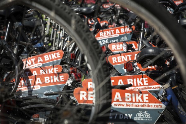 DEU Germany Germany Berlin Rental bikes in the city.bikes from the provider berlinandbike.com are parked on a site at the S-Bahn arches behind Zoo station