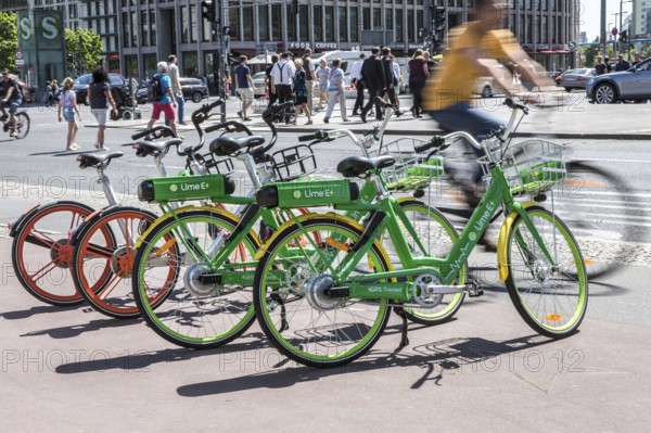 DEU Germany Germany Berlin Rental bikes in the city. Electric bikes from the provider Lime E and Mobikes at Potsdamer Platz