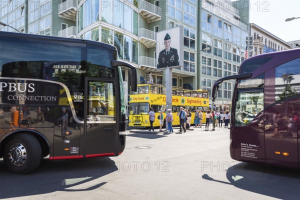 DEU Germany Germany Berlin Scene at Checkpoint Charlie, the former diplomatic border crossing in Berlin.bus transport