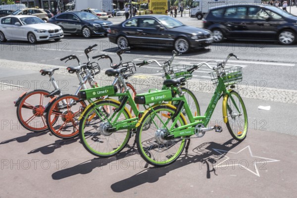 DEU Germany Germany Berlin Rental bikes in the city. Electric bikes from the provider Lime E and Mobikes at Potsdamer Platz