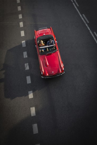 DEU Germany Germany Berlin Scene with convertible driver on Schlossstraße in Steglitz