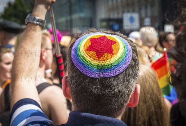 DEU Germany Germany Berlin Scenes of the Christopher Street Day CSD on a hot Saturday . Jew with rainbow kippa