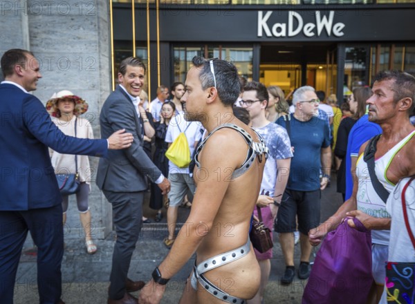 DEU Germany Germany Berlin Scenes of the Christopher Street Day CSD on a hot Saturday . At the entrance of the KaDeWe
