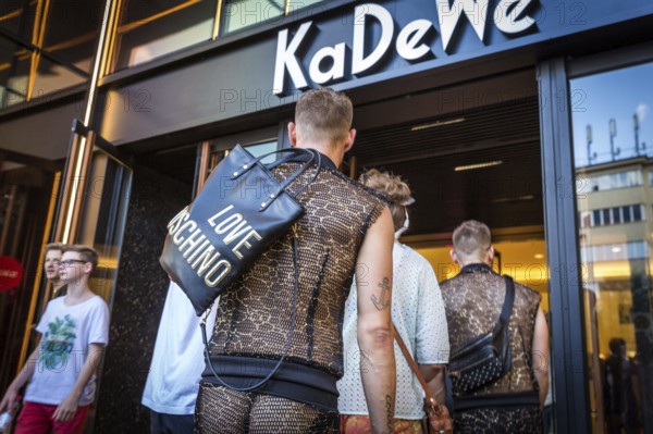 DEU Germany Germany Berlin Scenes of the Christopher Street Day CSD on a hot Saturday . At the entrance of the KaDeWe