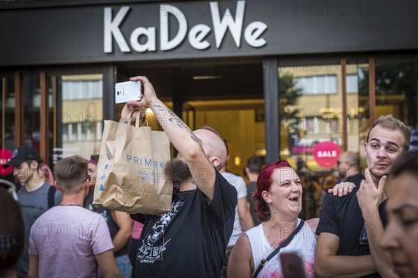 DEU Germany Germany Berlin Scenes of the Christopher Street Day CSD on a hot Saturday . At the entrance of the KaDeWe