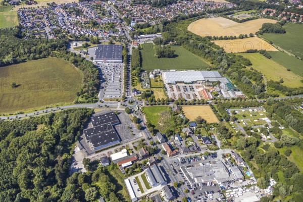 Aerial view, business location Münsterstraße, roundabout Warendorfer Straße - Münsterstraße, Real department stores', Hamm, Ruhr area, North Rhine-Westphalia, Germany, DE, Europe, birds-eyes, view, aerial photography, aerial photography, overview, overview, bird's eye view, shopping, food, clothing, consumption, consumer, road traffic, connection, road layout, intersection, junction, traffic management, driving licence, transport, traffic, infrastructure, logistics