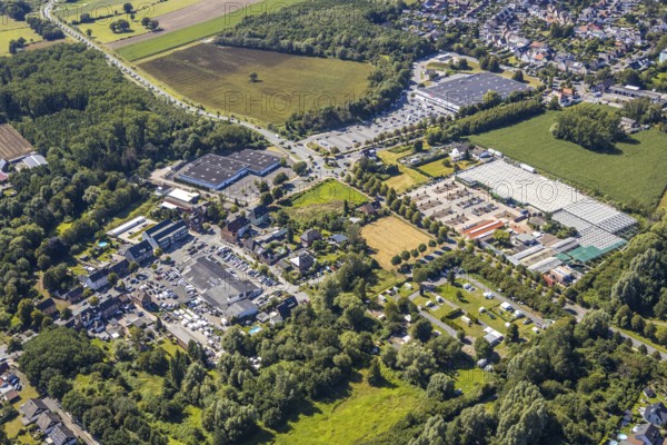 Aerial view, business location Münsterstraße, roundabout Warendorfer Straße - Münsterstraße, Real department stores', Hamm, Ruhr area, North Rhine-Westphalia, Germany, DE, Europe, birds-eyes, view, aerial photography, aerial photography, overview, overview, bird's eye view, shopping, food, clothing, consumption, consumer, road traffic, connection, road layout, intersection, junction, traffic management, driving licence, transport, traffic, infrastructure, logistics