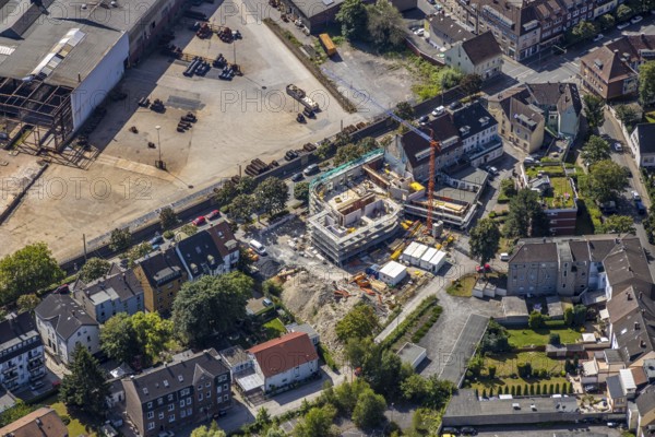 Aerial view, construction site at Wilhelmstraße 61-65, former Roxy cinema, new building of flats, Hamm, Ruhr area, North Rhine-Westphalia, Germany, DE, Europe, birds-eyes, view, aerial photograph, aerial photography, aerial photography, overview, overview, bird's eye view, living, flat, houses, residential buildings, housing estate, settlement