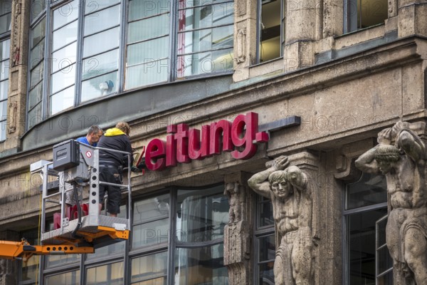 DEU Germany Germany Berlin The dismantling of the TAZ lettering on the old TAZ building on Rudi-Dutschke-Str