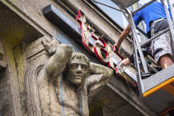 DEU Germany Germany Berlin The dismantling of the TAZ lettering on the old TAZ building on Rudi-Dutschke-Str