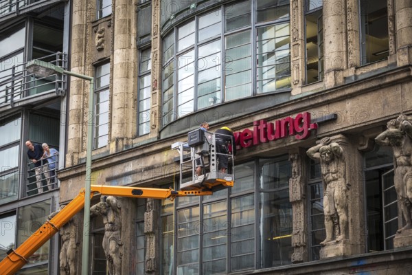 DEU Germany Germany Berlin The dismantling of the TAZ lettering on the old TAZ building on Rudi-Dutschke-Str