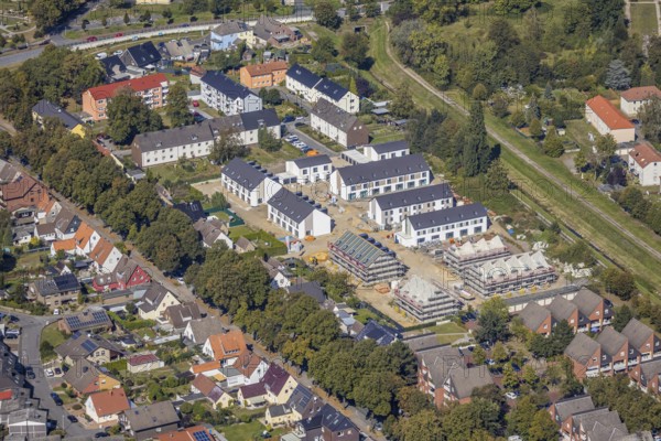 Aerial view, construction site, residential area Zum Torksfeld, am Herringer Bach, Herringen, Hamm, Ruhr area, North Rhine-Westphalia, Germany, construction work, construction vehicles, construction area, building site, building plots, construction project, construction site, DE, Datteln-Hamm Canal, Europe, River Lippe, property tax, real estate, capacity requirements, aerial view, aerial photography, aerial photography, multi-family houses, terraced houses, overview, bird's-eye view, housing estate, housing and living, residential area, residential buildings, housing estate, birds-eyes view, overview