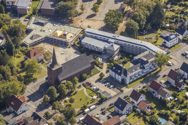 Aerial view, Heilig Kreuz catholic church, Caritas association Hamm, Caritas retirement home St. Josef, construction site, new building, Haus der Begegnung, Herringen, Hamm, Ruhr area, North Rhine-Westphalia, Germany, retirement home, retirement home, place of worship, construction work, building, construction area, building site, building plots, construction project, construction site, care and nursing, Buschkampstraße, DE, Europe, religious community, house of worship, church, parish, denomination, aerial view, aerial photography, aerial photography, new building, care facility, religion, retirement home, retirement residence, retirement centre, overview, bird's eye view, birds-eyes view, overview