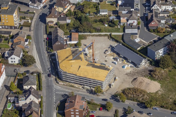 Aerial view, construction site residential buildings Waldenburger Straße corner Holzstraße, Herringen, Hamm, Ruhr area, North Rhine-Westphalia, Germany, construction work, construction area, construction site, building plots, construction crane, construction measure, construction project, construction site, DE, development, Europe, property tax, real estate, capacity requirement, aerial photograph, aerial photography, aerial photography, new construction, renovation, overview, bird's eye view, residential complex, living and living, residential area, residential buildings, residential neighbourhood, housing estate, birds-eyes view, overview