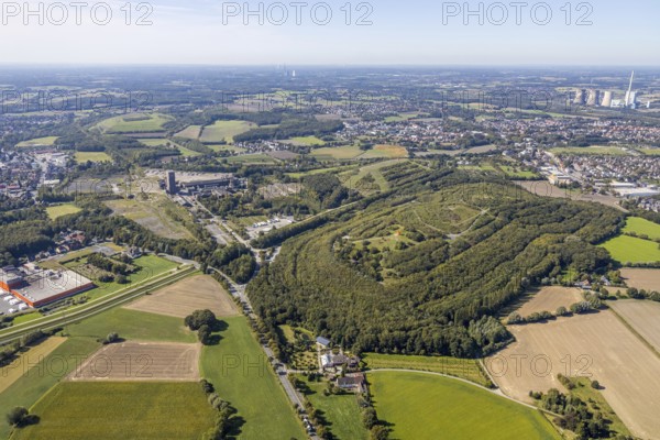 Aerial view, Kissinger Höhe, slag heap, RWE Power AG Gersteinwerk power station, Hamm, Ruhr area, North Rhine-Westphalia, Germany, slag heap, Heinrich Robert mine, DE, Europe, distant view, slag heap, slag heap landscape, slag heap sign, industrial plant, industrial site, power station, aerial photograph, aerial photography, aerial photography, park, tower, overview, bird's-eye view, forest area, birds-eyes view, former Ost colliery, historical, historical site, overview, destroyed building