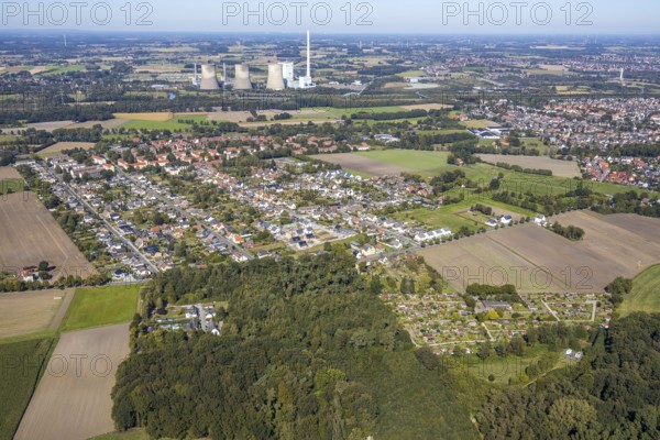 Aerial view, Herringer Heide housing estate, Rosenstrasse development area, RWE Power AG Gersteinwerk power station, Hamm, Ruhr area, North Rhine-Westphalia, Germany, construction work, construction, construction area, building site, building plots, construction project, construction site, DE, Europe, property tax, real estate, power plant, aerial view, aerial photography, aerial photography, new construction, overview, bird's-eye view, housing estate, residential area, residential buildings, residential quality, residential neighbourhood, housing estate, birds-eyes view, overview