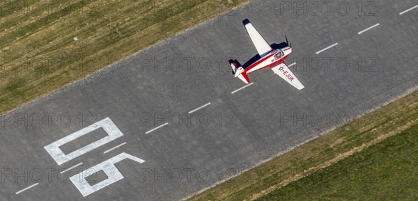 Aerial photo, Hamm airfield, aircraft Klemm 107 B, D-EJUK, Hamm, Ruhr area, North Rhine-Westphalia, Germany, DE, Europe, flight emission, airport, aircraft noise, airfield, airfield area, aircraft, aircraft D-EJUK, runway, aerial photo, aerial photography, aerial photography, runway, overview, bird's-eye view, overview