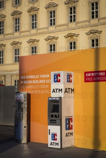 DEU Germany Germany Berlin An EC machine in front of the façade of the rebuilt city palace