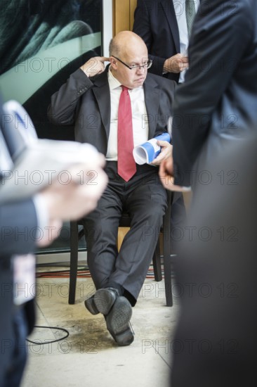 DEU Germany Germany Berlin Presentation of the CDU/CSU election programme in the Konrad Adenauer House. Peter Altmaier listens to the press conference