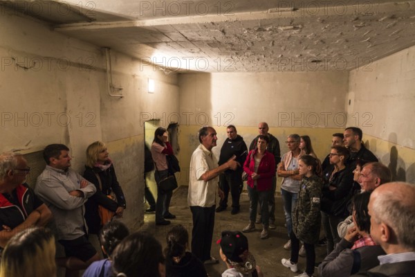 DEU Germany Germany Berlin Open day at the Hohenschönhausen memorial site, the former State Security prison, with a guide in a cell in the basement, the so-called UBoot