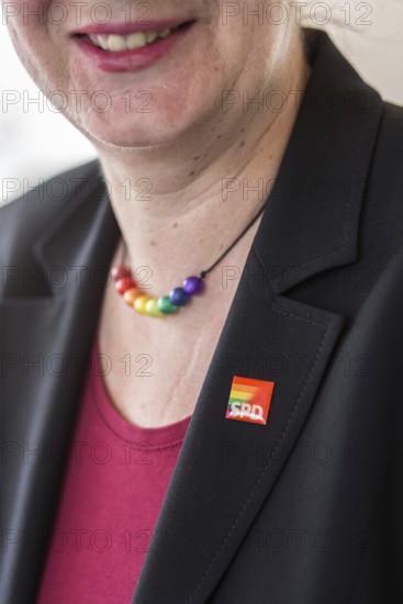 DEU Germany Germany Berlin Raising the rainbow flag with Petra Nowacki and SPD General Secretary Hubertus Heil in front of the SPD headquarters, the Willy Brandt House, four days in front of CSD. Necklace of Petra Nowacki