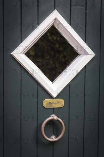 DEU Germany Germany Rysum The name Merkel is written on a door in the East Frisian town of Rysum