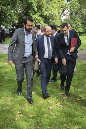 DEU Germany Germany Berlin The SPD chairman and candidate for chancellor Martin Schulz leaves Mehringplatz with his advisors and campaign managers after the inauguration of the memorial to Marie Juchacz, the founder of the Workers' Welfare Association (AWO)