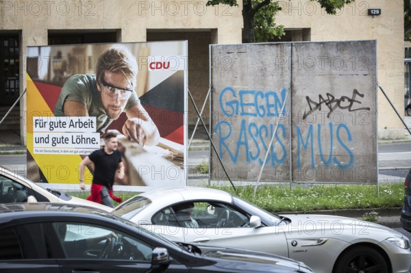 DEU Germany Germany Berlin The back of a poster for the Bundestag election is inscribed with protest against racism