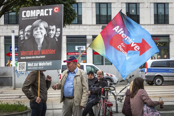 DEU Germany Germany Dresden Pegida demonstration in the city centre. AFD flag and Merkel protest