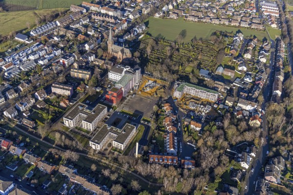Aerial view, construction site Widumer Höfe, the future retirement home of the St. Elisabeth Group, St. Peter and Paul Catholic Church, Widumer Straße Catholic Cemetery, Sodingen, Herne, Ruhr area, North Rhine-Westphalia, Germany. Widumer Straße cemetery, Sodingen, Herne, Ruhr area, North Rhine-Westphalia, Germany, retirement home, old people's home, retirement home, place of worship, construction work, building, construction area, building site, building plots, construction project, construction site, burial site, care and nursing, DE, Europe, cemetery, memorial site, religious community, place of worship, house of God, crypt, graves, burial ground, church, parish, denomination, aerial photograph, aerial photography, aerial photography, Rhine-Ruhr metropolitan region, new building, care facility, religion, resting place, retirement home, retirement residence, retirement home, retirement centre, overview, bird's-eye view, Widumer Straße, birds-eyes view, overview