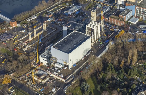Aerial photograph, STEAG Herne combined heat and power plant on the Rhine-Herne Canal, construction site of Steag's new gas and steam power plant, Baukau-West, Herne, Ruhr area, North Rhine-Westphalia, Germany, construction work, construction, construction area, construction site, construction measure, construction project, construction site, DE, E-Werk, Europe, district heating, combined cycle power plant, Hertener Straße, power plant, aerial view, aerial photography, aerial photography, Rhine-Ruhr metropolitan region, new construction, coal-fired power plant, overview, bird's-eye view, overview