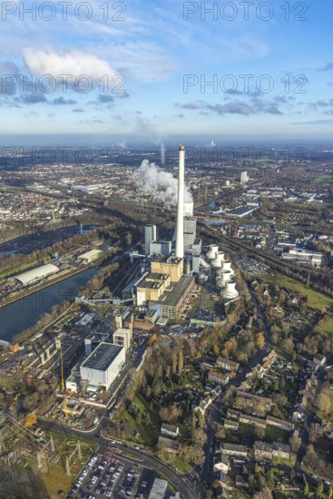Aerial view, STEAG combined heat and power plant Herne on the Rhine-Herne Canal, construction site new gas and steam power plant of Steag, Baukau-West, Herne, Ruhr area, North Rhine-Westphalia, Germany, construction work, construction, construction area, construction site, construction project, construction site, DE, steam cloud, power plant, Europe, distant view, district heating, CCGT power plant, Hertener Straße, power plant, aerial view, aerial photography, aerial photography, Rhine-Ruhr metropolitan region, new construction, smoke cloud, coal-fired power plant, overview, bird's eye view, birds-eyes view, overview