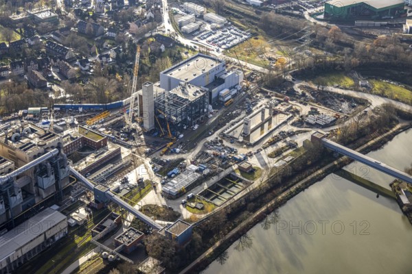 Aerial photograph, STEAG Herne combined heat and power plant on the Rhine-Herne Canal, construction site of Steag's new gas and steam power plant, Baukau-West, Herne, Ruhr area, North Rhine-Westphalia, Germany, construction work, construction, construction area, construction site, construction measure, construction project, construction site, DE, E-Werk, Europe, district heating, combined cycle power plant, Hertener Straße, power plant, aerial view, aerial photography, aerial photography, Rhine-Ruhr metropolitan region, new construction, coal-fired power plant, overview, bird's-eye view, overview
