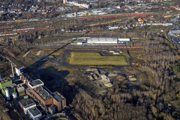 Aerial view, construction site new Stadler Schienenfahrzeuge branch, former General Blumenthal mine site, former Uniper Shamrock power plant, Wanne-Süd, Herne, Ruhr area, North Rhine-Westphalia, Germany, railway tracks, DE, Europe, commercial enterprises, commercial area, commercial site, commercial use, industrial facilities, industrial area, industrial site, Kastanienallee, aerial view, aerial photography, aerial photography, Rhine-Ruhr metropolitan region, overview, bird's-eye view, bird's-eye view, overview