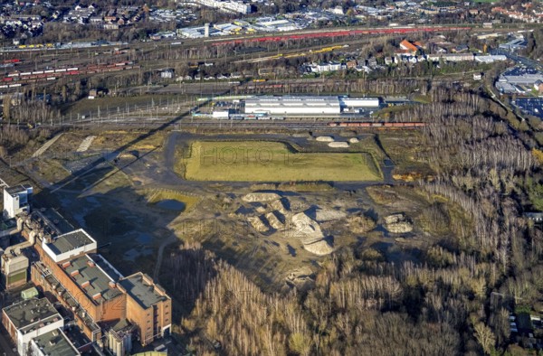 Aerial view, construction site new Stadler Schienenfahrzeuge branch, former General Blumenthal mine site, former Uniper Shamrock power plant, Wanne-Süd, Herne, Ruhr area, North Rhine-Westphalia, Germany, railway tracks, DE, Europe, commercial enterprises, commercial area, commercial site, commercial use, industrial facilities, industrial area, industrial site, Kastanienallee, aerial view, aerial photography, aerial photography, Rhine-Ruhr metropolitan region, overview, bird's-eye view, bird's-eye view, overview