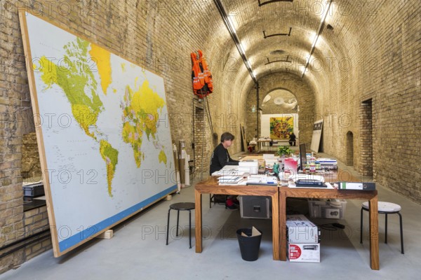 DEU Germany Germany Berlin The Chinese artist Ai Weiwei in his studio in the vaulted cellar of the Pfefferberg in the centre of Berlin