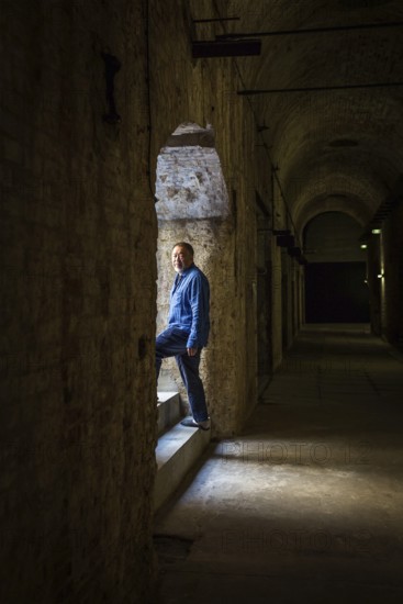 DEU Germany Germany Berlin The Chinese artist Ai Weiwei in his studio in the vaulted cellar of the Pfefferberg in the centre of Berlin