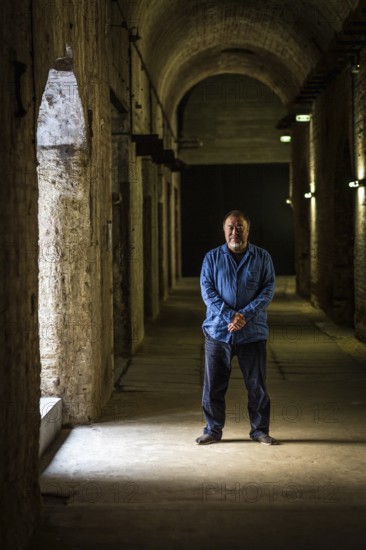 DEU Germany Germany Berlin The Chinese artist Ai Weiwei in his studio in the vaulted cellar of the Pfefferberg in the centre of Berlin