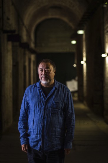 DEU Germany Germany Berlin The Chinese artist Ai Weiwei in his studio in the vaulted cellar of the Pfefferberg in the centre of Berlin