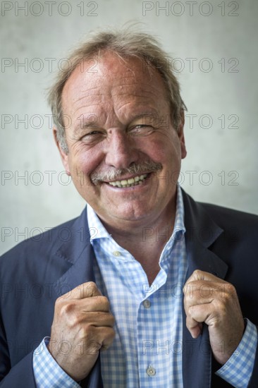 DEU Germany Germany Berlin The federal chairman of the Verdi trade union, Frank Bsirske, poses in the Taz building