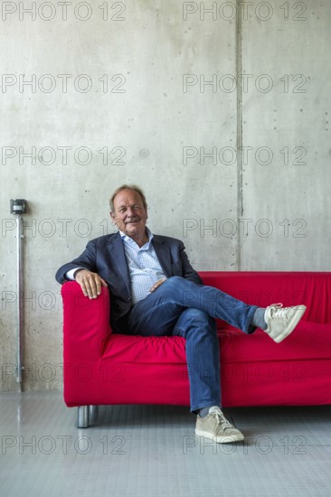 DEU Germany Germany Berlin The federal chairman of the Verdi trade union, Frank Bsirske, poses in the Taz building