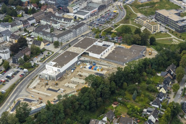 Aerial view, construction site new building at Hefelmann-Park, shopping centre, Westfalenstraße, former Kiekert site, Heiligenhaus, Ruhr area, North Rhine-Westphalia, Germany, Am Hefelmann-Park, construction work, construction, construction area, building site, building plots, construction measure, construction project, construction site, DE, Europe, aerial view, aerial photography, aerial photography, new building, panorama cycle path, overview, bird's-eye view, overview, local supply centre, former foundry Hitzbleck