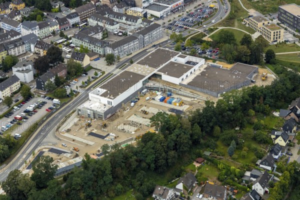 Aerial view, construction site new building at Hefelmann-Park, shopping centre, Westfalenstraße, former Kiekert site, Heiligenhaus, Ruhr area, North Rhine-Westphalia, Germany, Am Hefelmann-Park, construction work, construction, construction area, building site, building plots, construction measure, construction project, construction site, DE, Europe, aerial view, aerial photography, aerial photography, new building, panorama cycle path, overview, bird's-eye view, overview, local supply centre, former foundry Hitzbleck