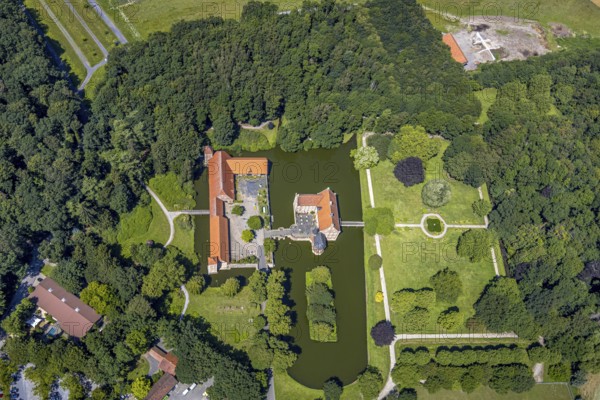 Aerial view, Burg Hülshoff, Museum in honour of the poet Annette von Droste-Hülshoff, Havixbeck, Münsterland, North Rhine-Westphalia, Germany, Annette von Droste-Hülshoff, bridge, castle, castle complex, DE, parental home, Europe, birthplace, moat, manor house, manor building, courtyard complex, aerial view, aerial photography, aerial photography, Renaissance complex, castle, castle garden, overview, defence system, bird's eye view, moated castle, moated castle, moated castle, bird's eye view, overview