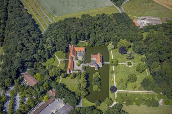 Aerial view, Burg Hülshoff, Museum in honour of the poet Annette von Droste-Hülshoff, Havixbeck, Münsterland, North Rhine-Westphalia, Germany, Annette von Droste-Hülshoff, bridge, castle, castle complex, DE, parental home, Europe, birthplace, moat, manor house, manor building, courtyard complex, aerial view, aerial photography, aerial photography, Renaissance complex, castle, castle garden, overview, defence system, bird's eye view, moated castle, moated castle, moated castle, bird's eye view, overview